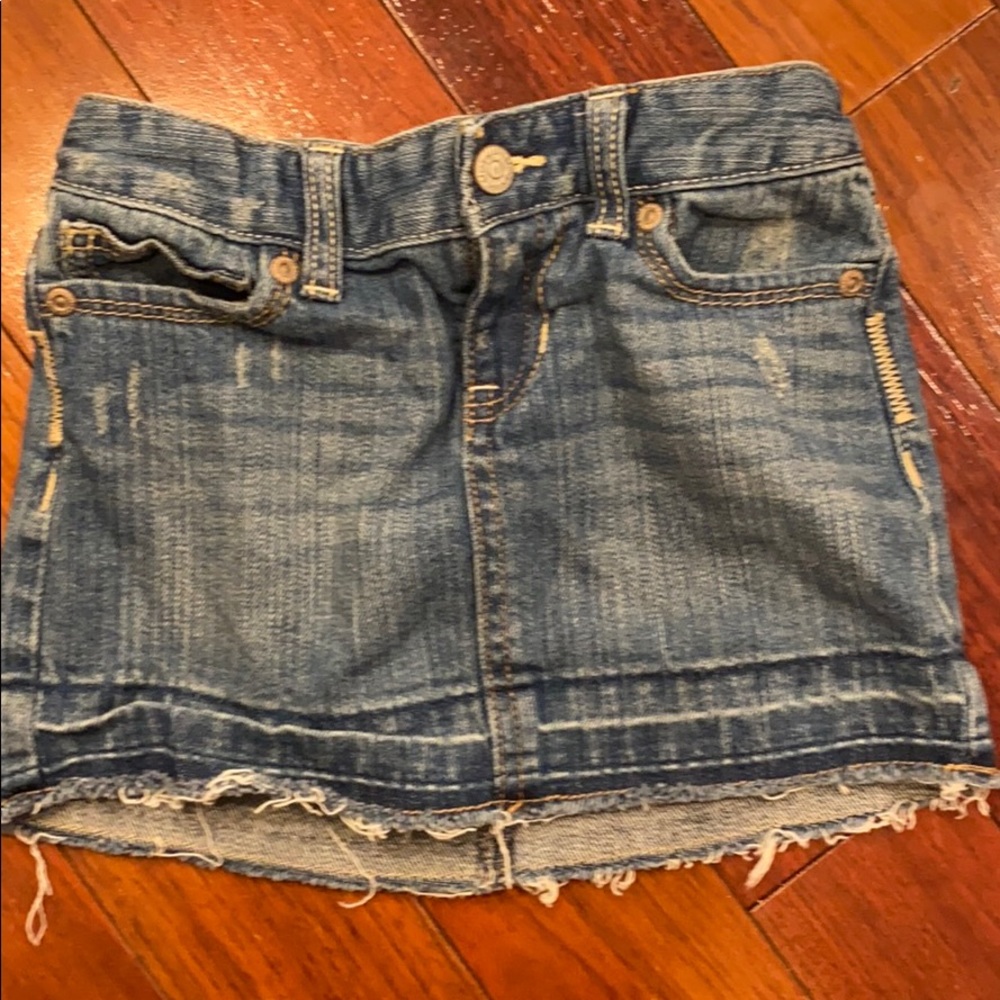 Distressed jean miniskirt